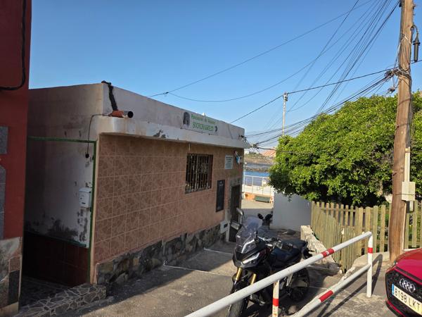 Organización local activa en la vida comunitaria Fachada de la Asociación de Vecinos de Bocacangrejo